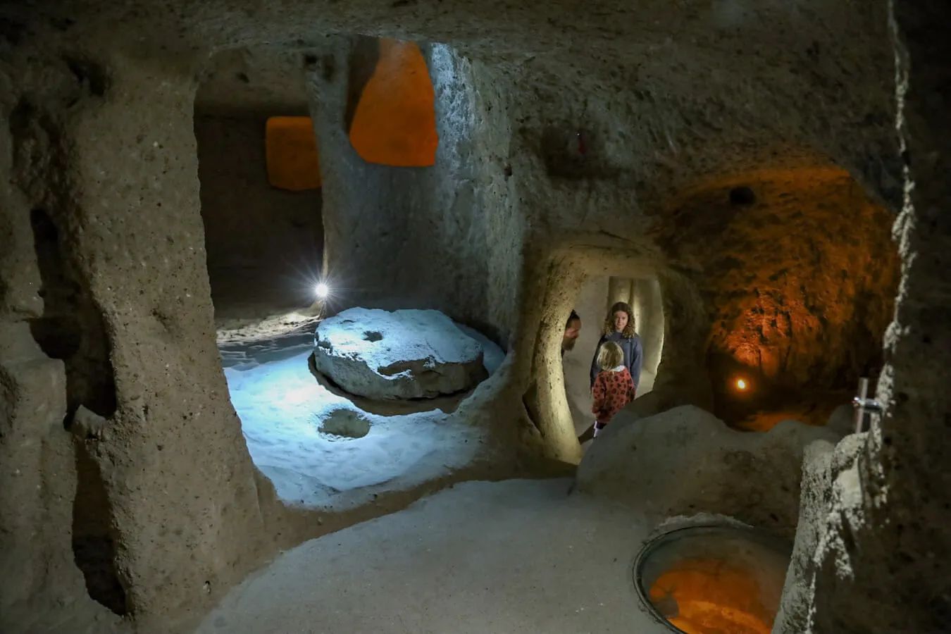 Family visit the underground city of Kaymakli in Cappadocia