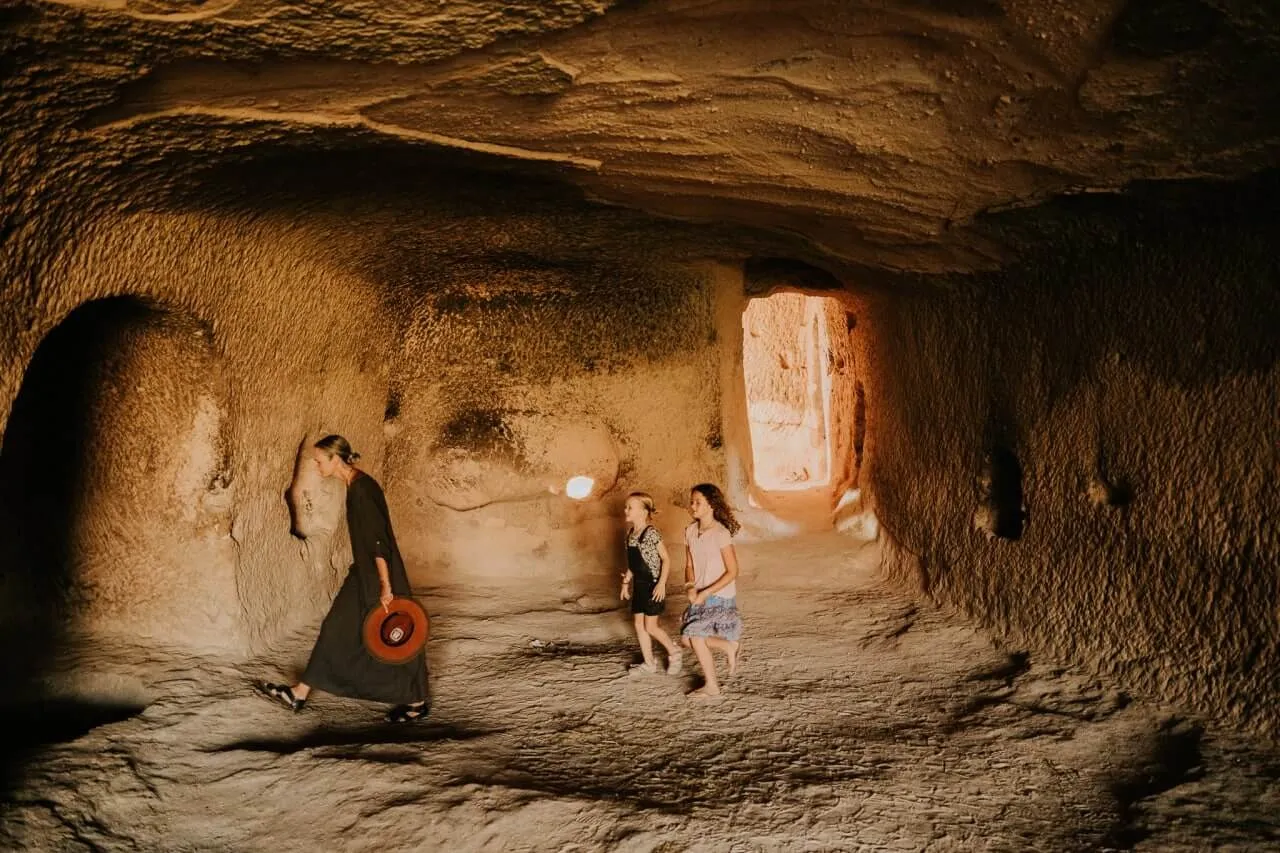 Family walk through open air museum in Cappadocia
