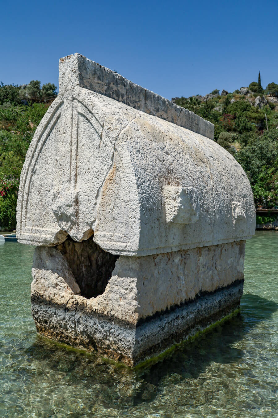 A tomb sits in the clear water of Simena (Kalekoy) village.  This is a beautiful day trip and place to visit in Kas.