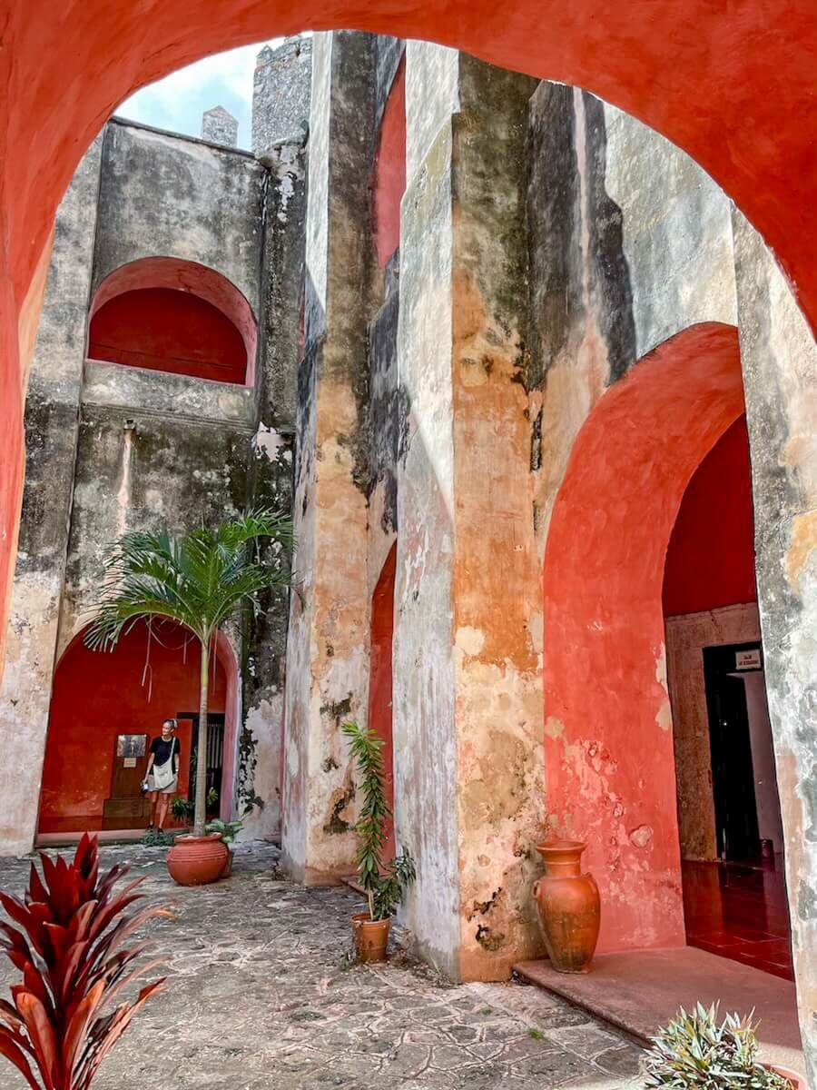 Inside the rose coloured walls and arches of the Convento de San Bernardino de Siena - a must see on a list of things to do in Valladolid