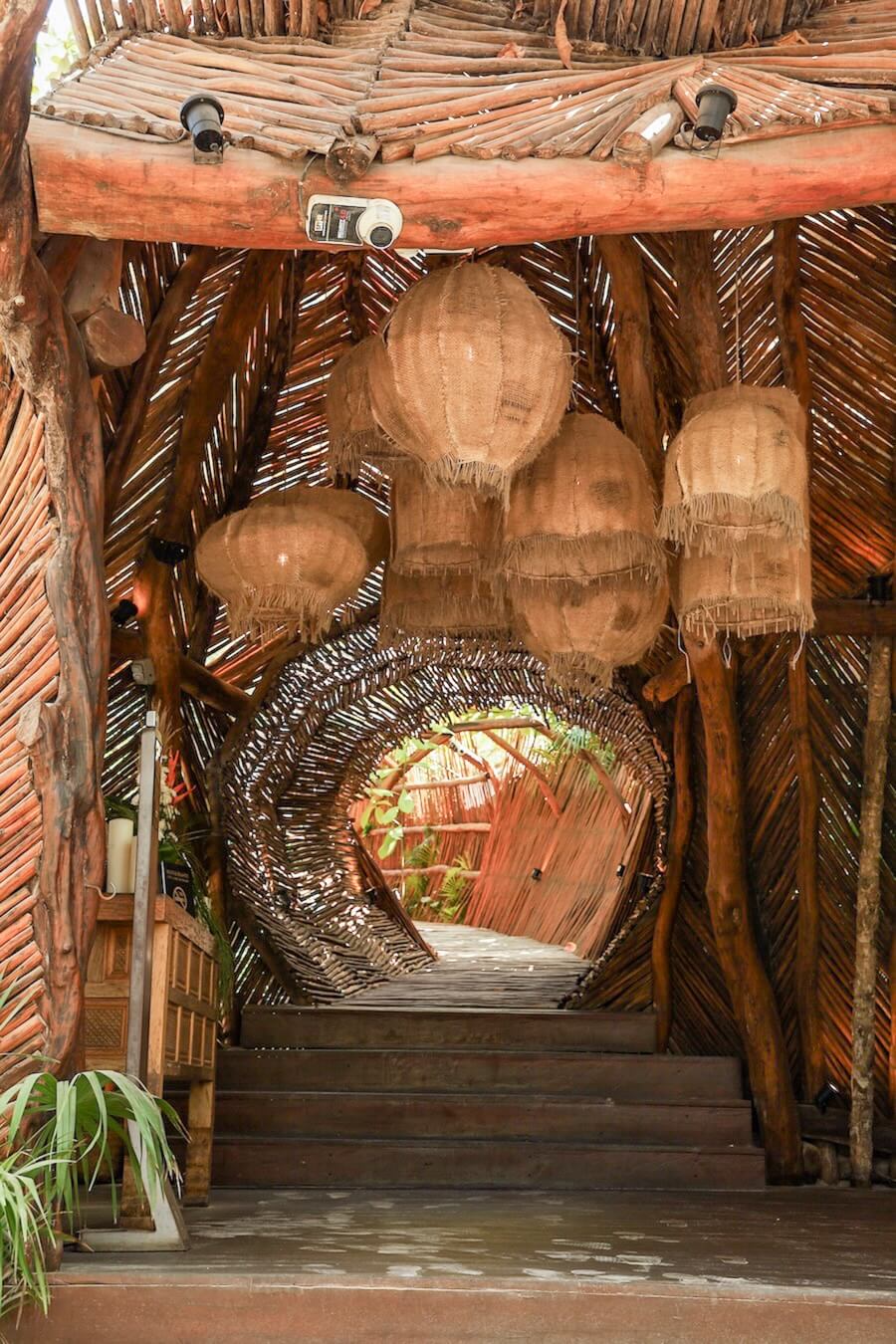 An extravagant entrance to a Tulum Beach Club and Hotel - a day trip option from Valladolid