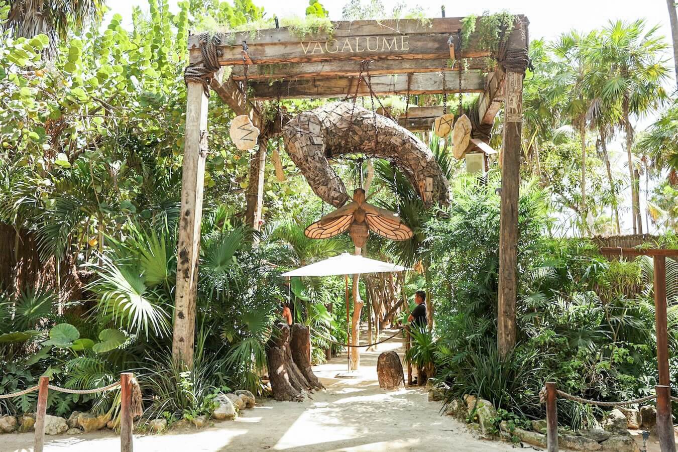 An extravagant entrance to a Tulum Beach Club and Hotel - a day trip option from Valladolid