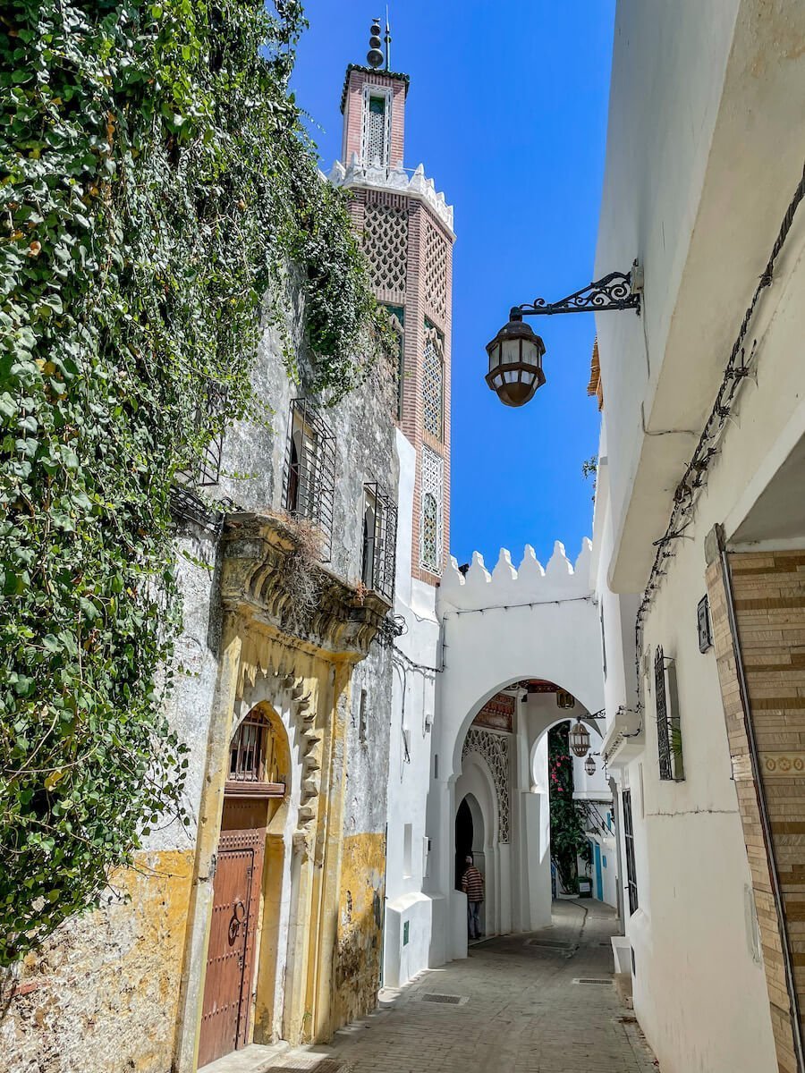 A mosque minaret in the kasbah streets of Tangier a beautiful part of the city to explore for a Tangier itinerary