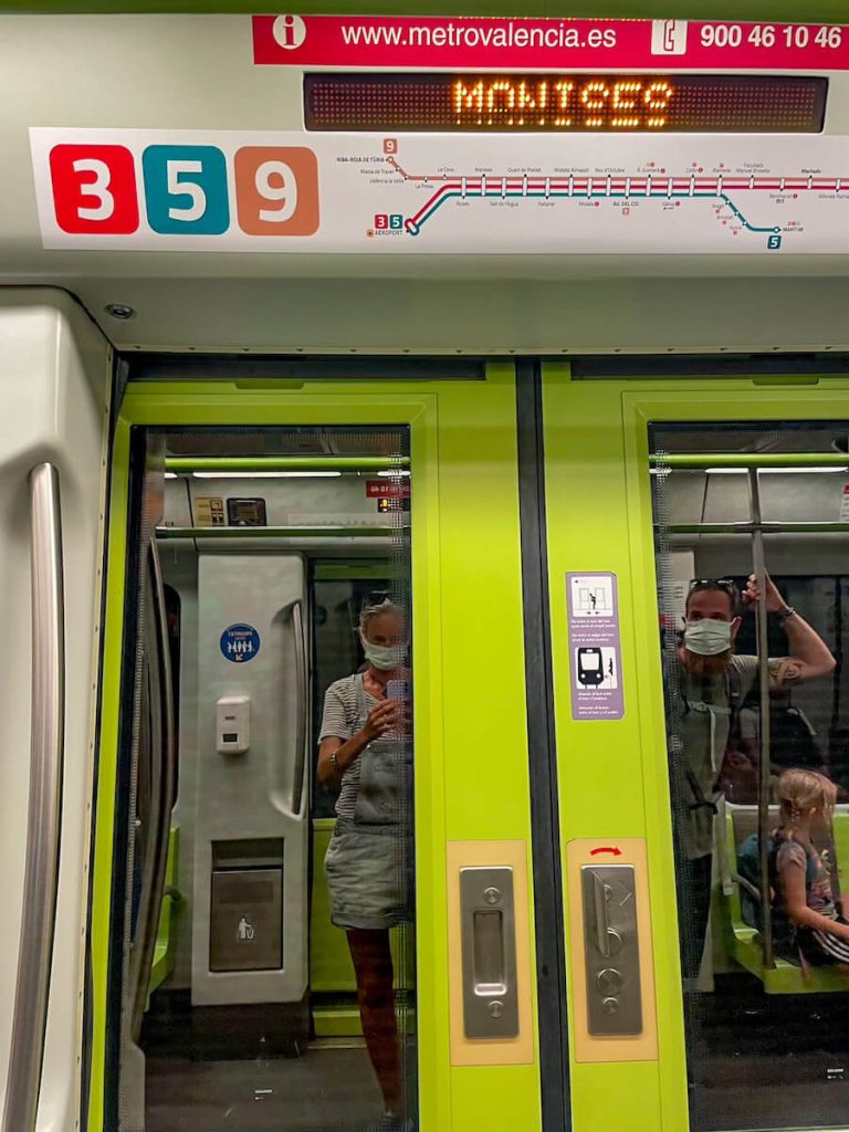 The Valencia Metro red line 3, green line 5, and brown line 9 on it's way to the airport. 