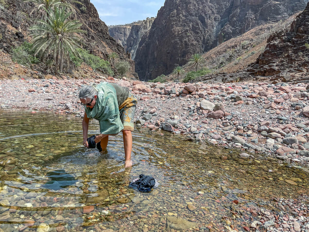 Washing clothes in the wadi in Socotra Island Yemen on a 1 week visit