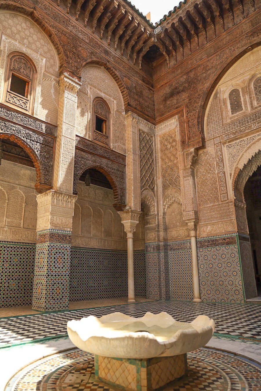 Inside the Attarine madrasa in the Fes Medina on a guided walking tour - this is a popular destination to visit while staying for two days in Fes