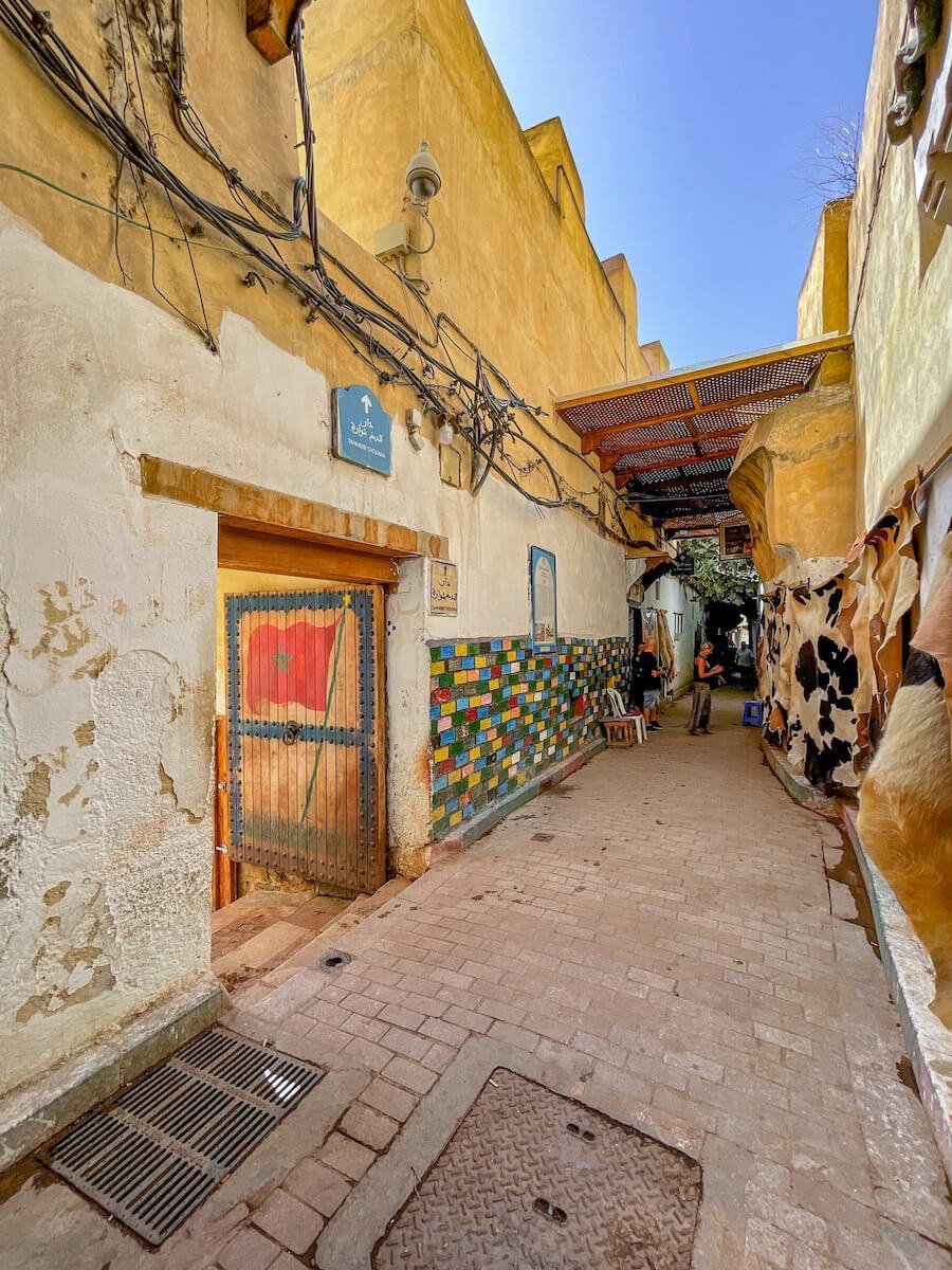 The main entrance towards the ground level of the Chouara Tannery in the Fes Medina photographed on a guided walking tour.