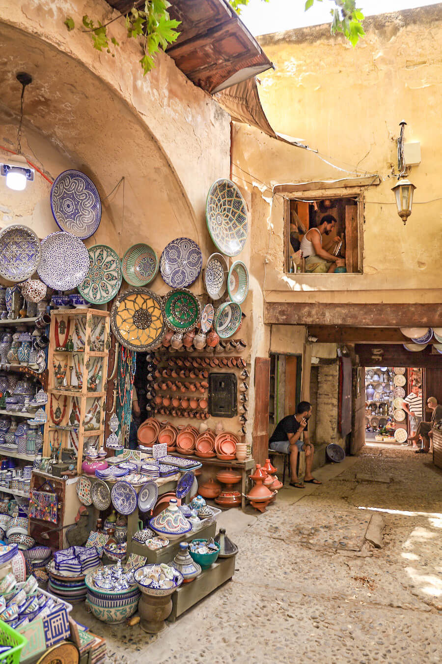 Men at work in the Fes Medina in Morocco, one of the best places to visit on a guided walking tour