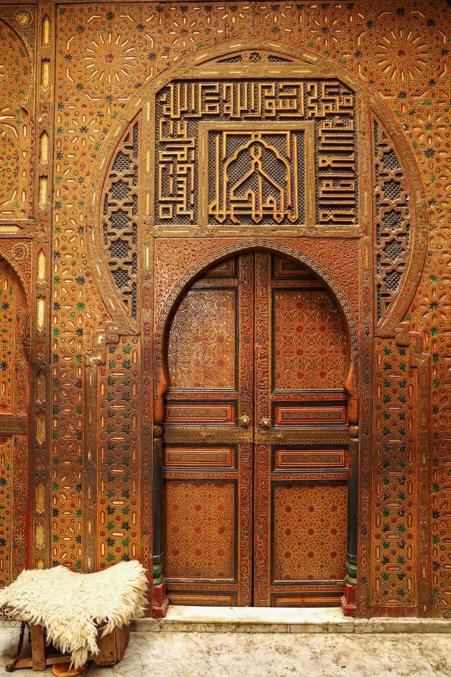 An intricately carved door in the Fes Medina seen on a guided walking tour.