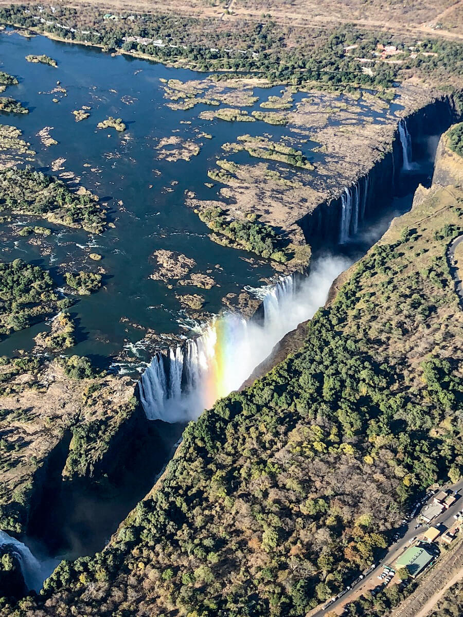 The Zambezi river cascading into the impressive Victoria Falls, photographed from a helicopter tour