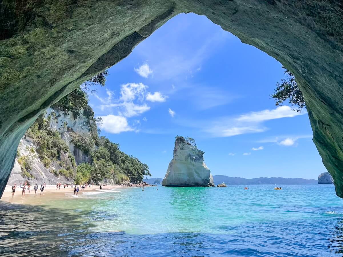The iconic archway at Cathedral Cove on a summer's day.