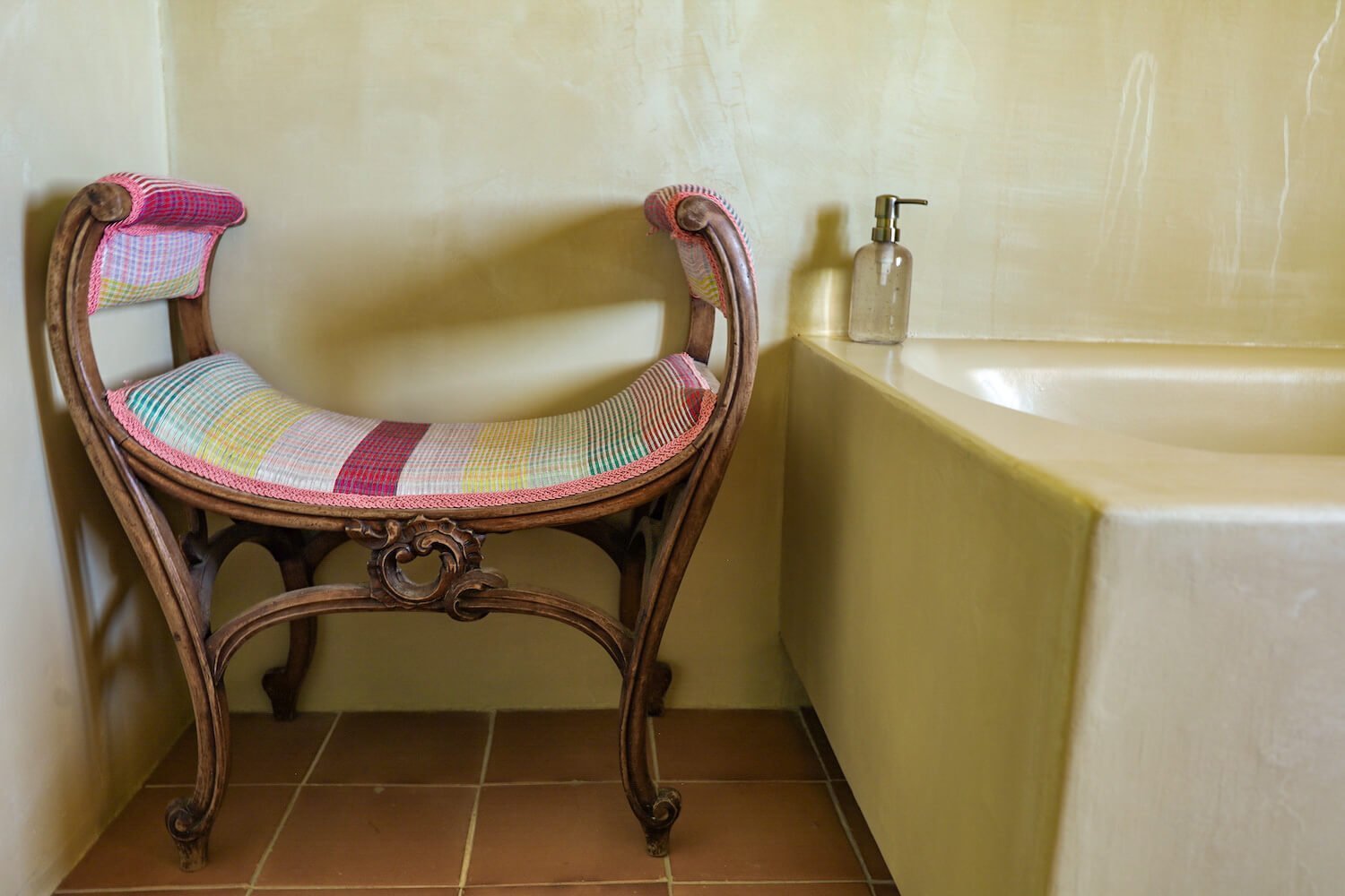 Bathroom chair and bathtub in a boutique hotel in Costa Blanca near Calpe