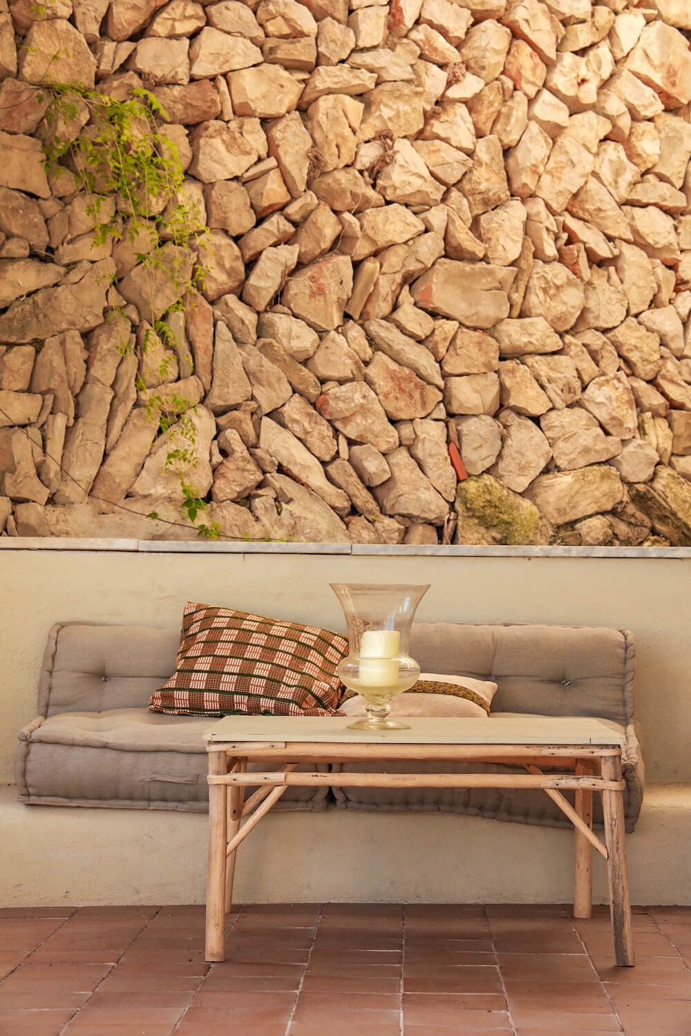 Cushions and sitting area on boutique hotel terrace in Costa Blanca in Spain