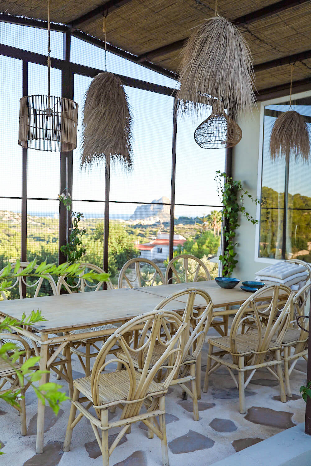 The outdoor terrace in the monkey cage in Villa Riu Blanc with views of Calpe Rock and the Mediterranean sea of Spain