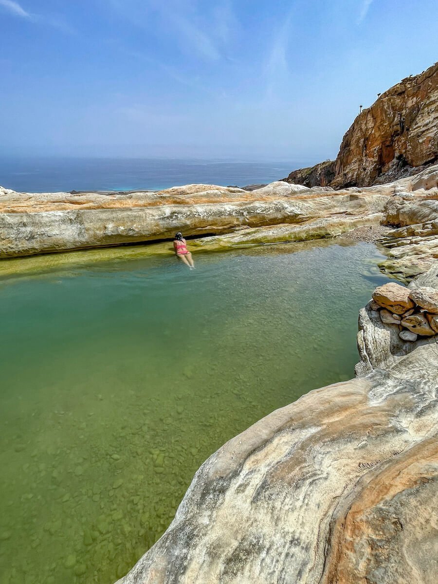 Traveller swims in the Infinity Pool at Homhil in socotra Island