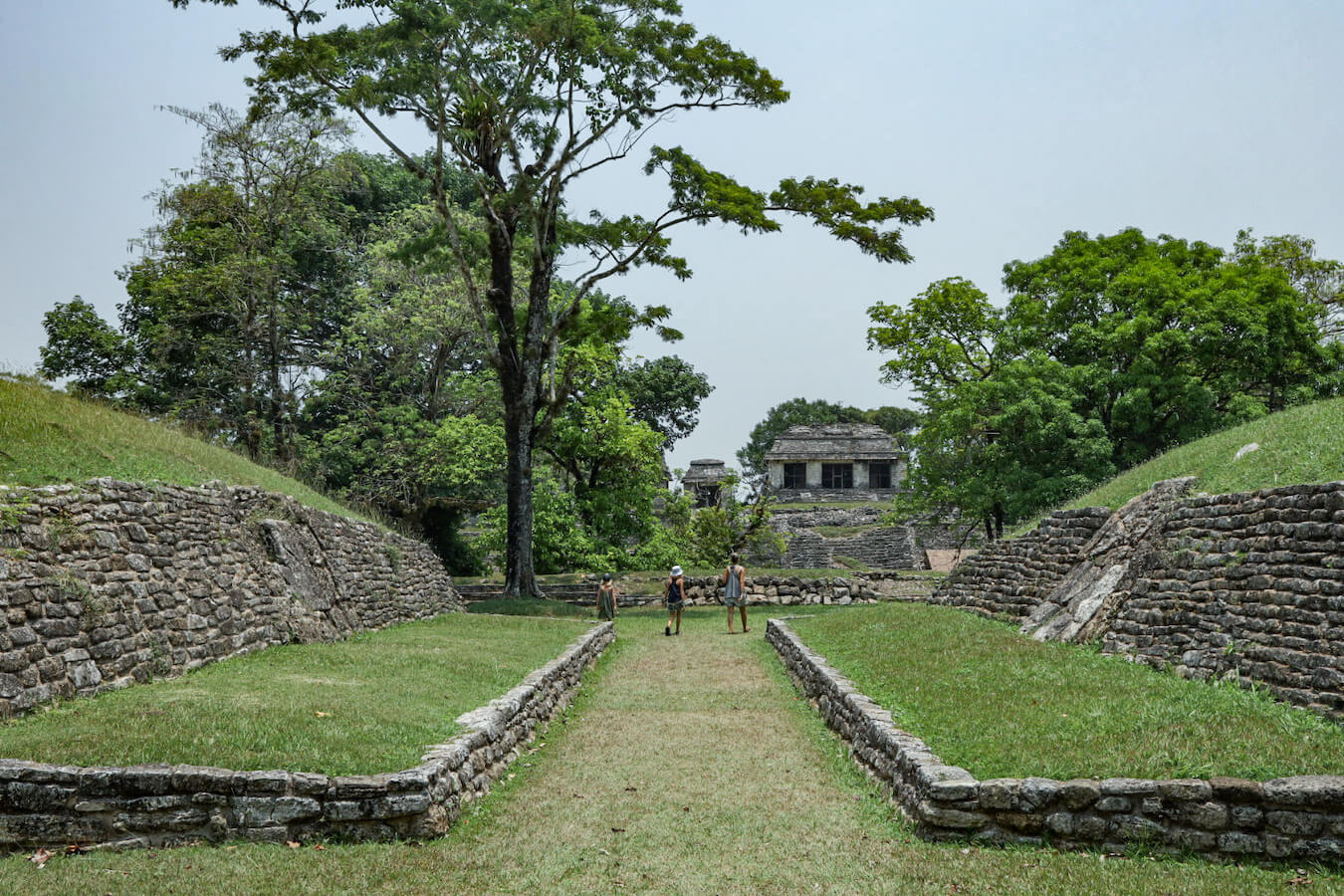 Mother and her two daughters at the far end of the ball Court while on a self guided tour of Palenque.