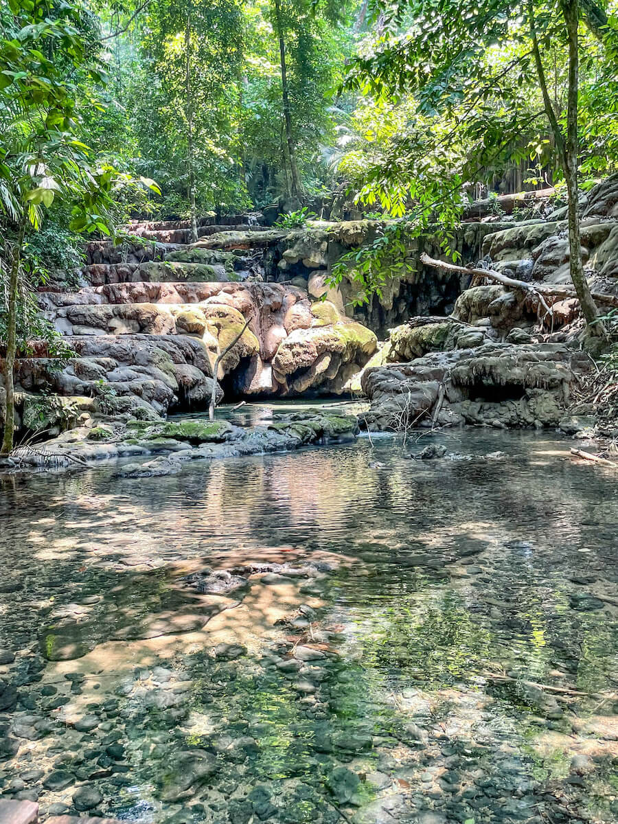 Cascades and pools inside the Palenque ruins.