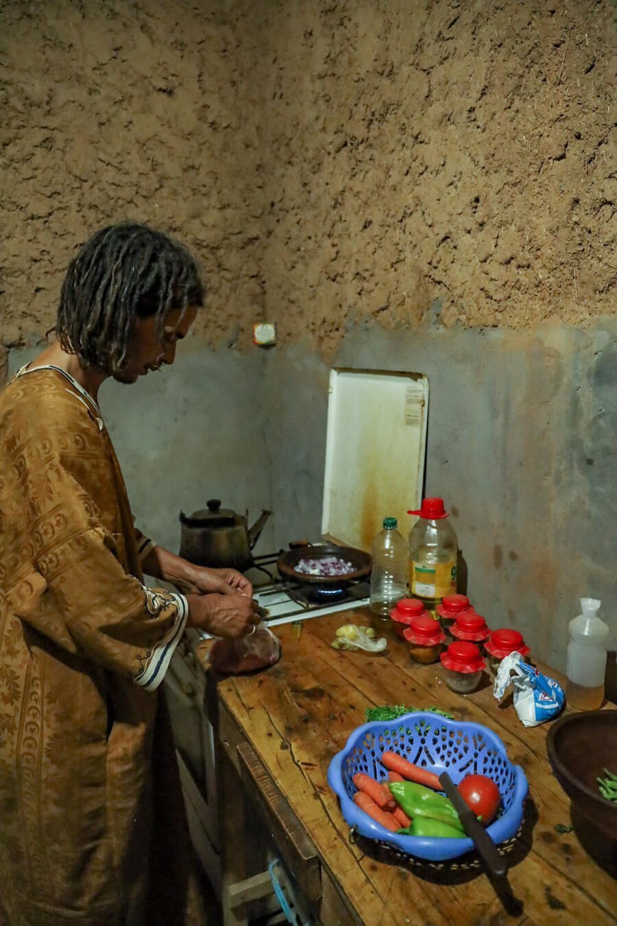 Moroccan host preparing dinner.