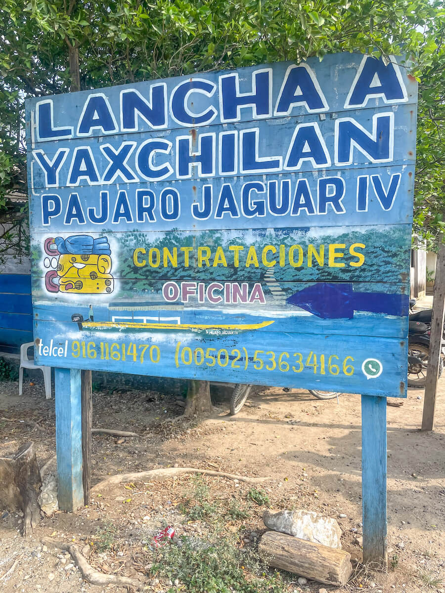A sign for Pajaro Jaguar boat tours to Yaxchilán. 