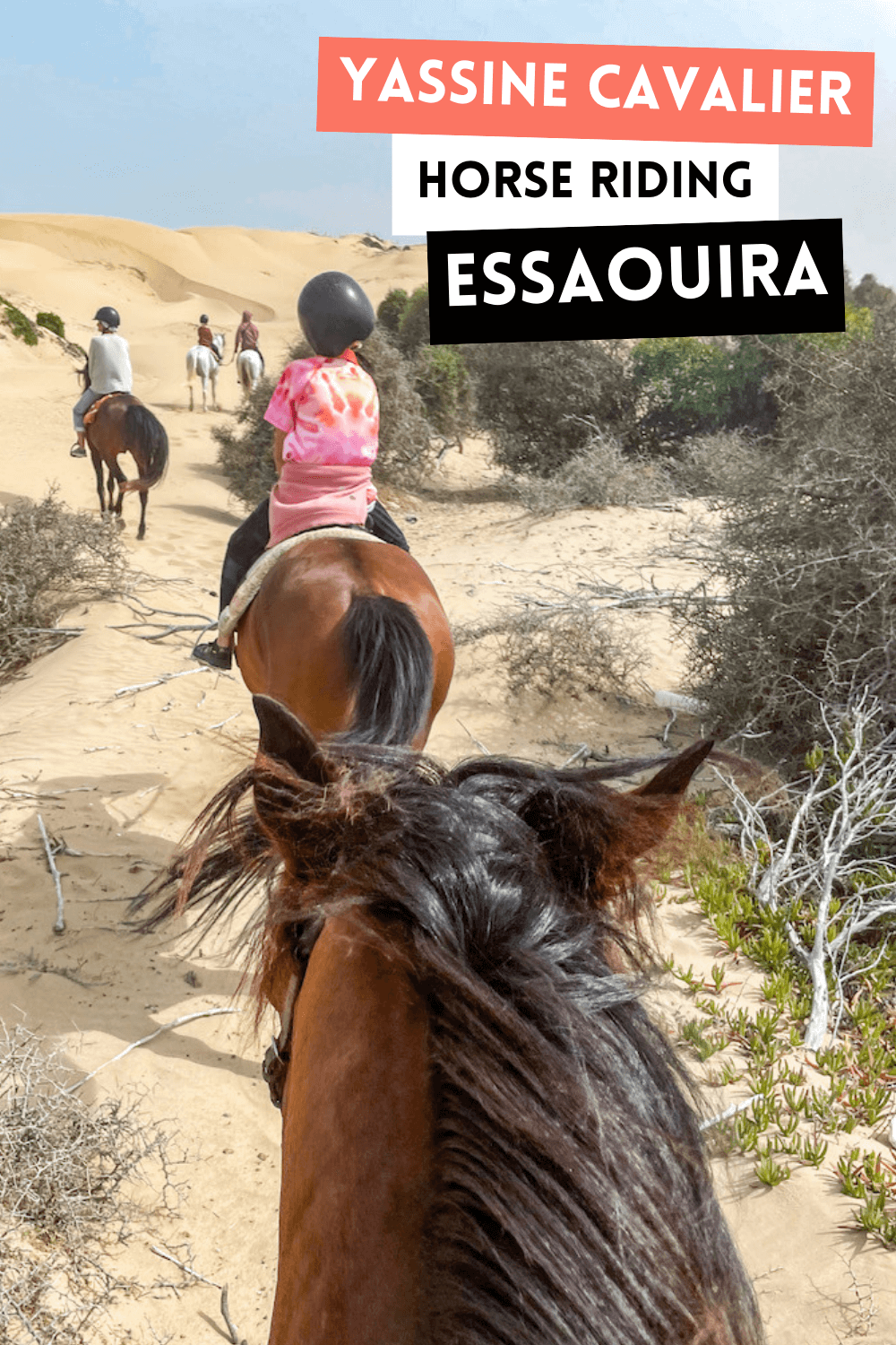Riding horseback through the sand dunes in Essaouira Morocco
